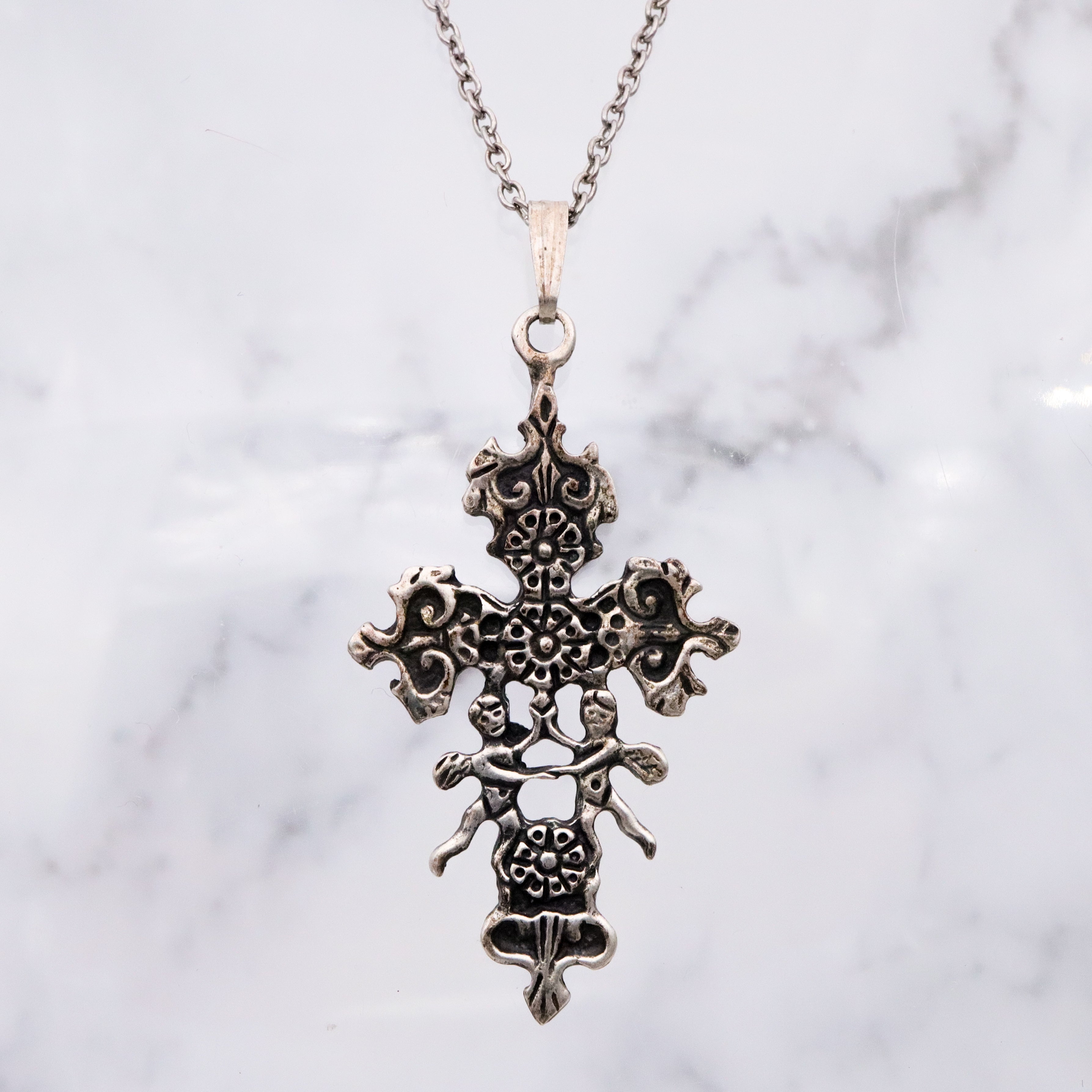 Antique sterling Caravaca cross pendant